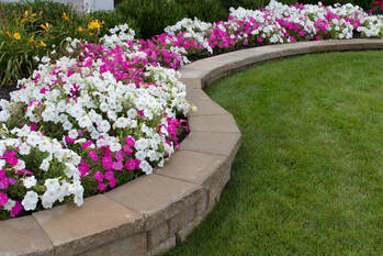 strong retaining wall for beautiful flower bed