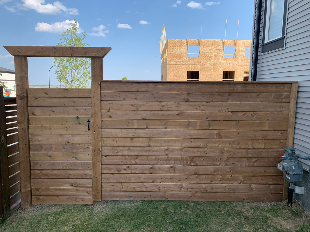 New wooden horizontal fence